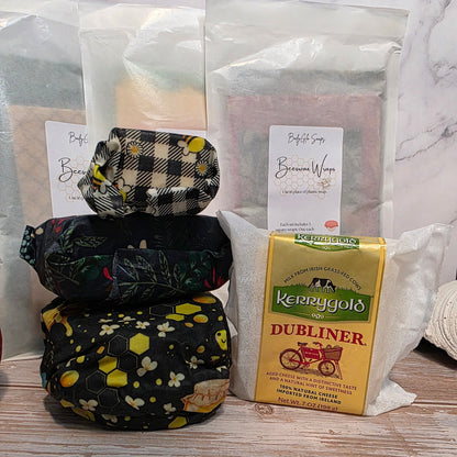 Stack of beeswax wraps with Kerrygold Dubliner cheese packaging on a marble surface