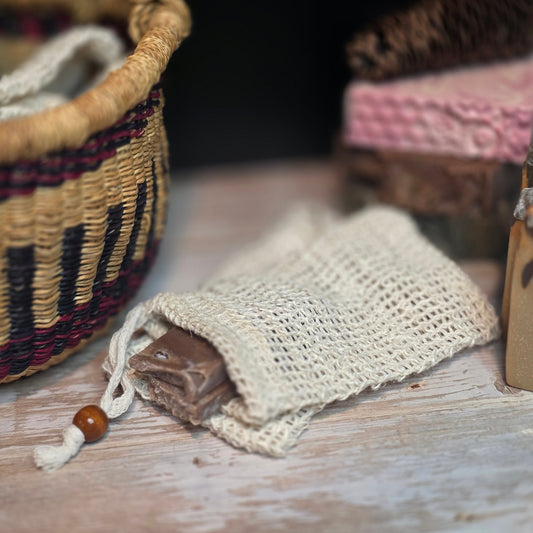 Close-up of a textured fabric item on a wooden surface with a blurred background